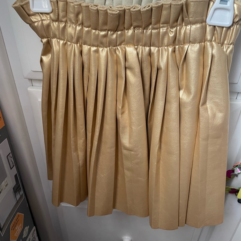 Girls size medium gold faux leather skirt